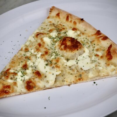 The PZA Denver, CO White Cheese Pizza Slice